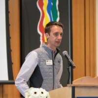 Kyle talking at event